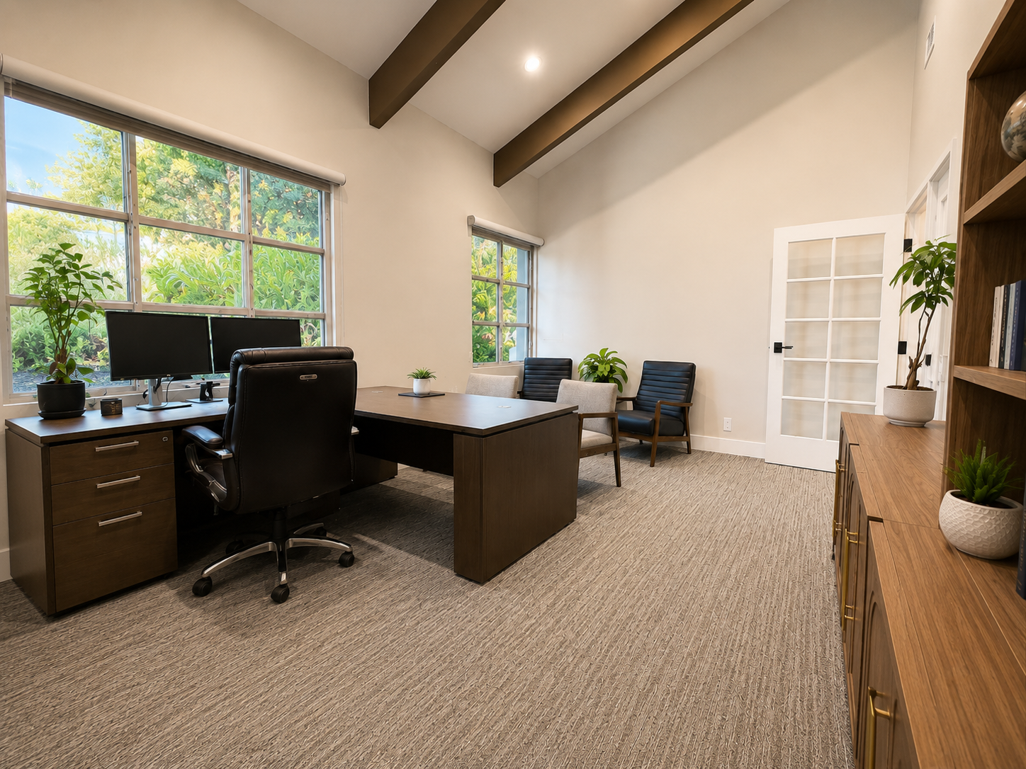 Spacious executive office with vaulted ceiling and exposed beams