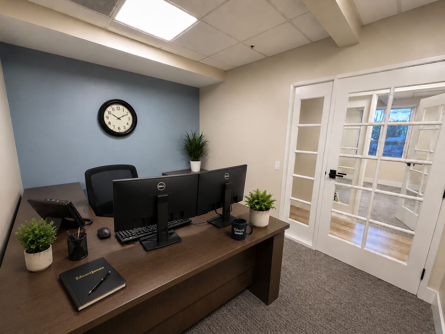 AMGC branded office space with logo wall signage